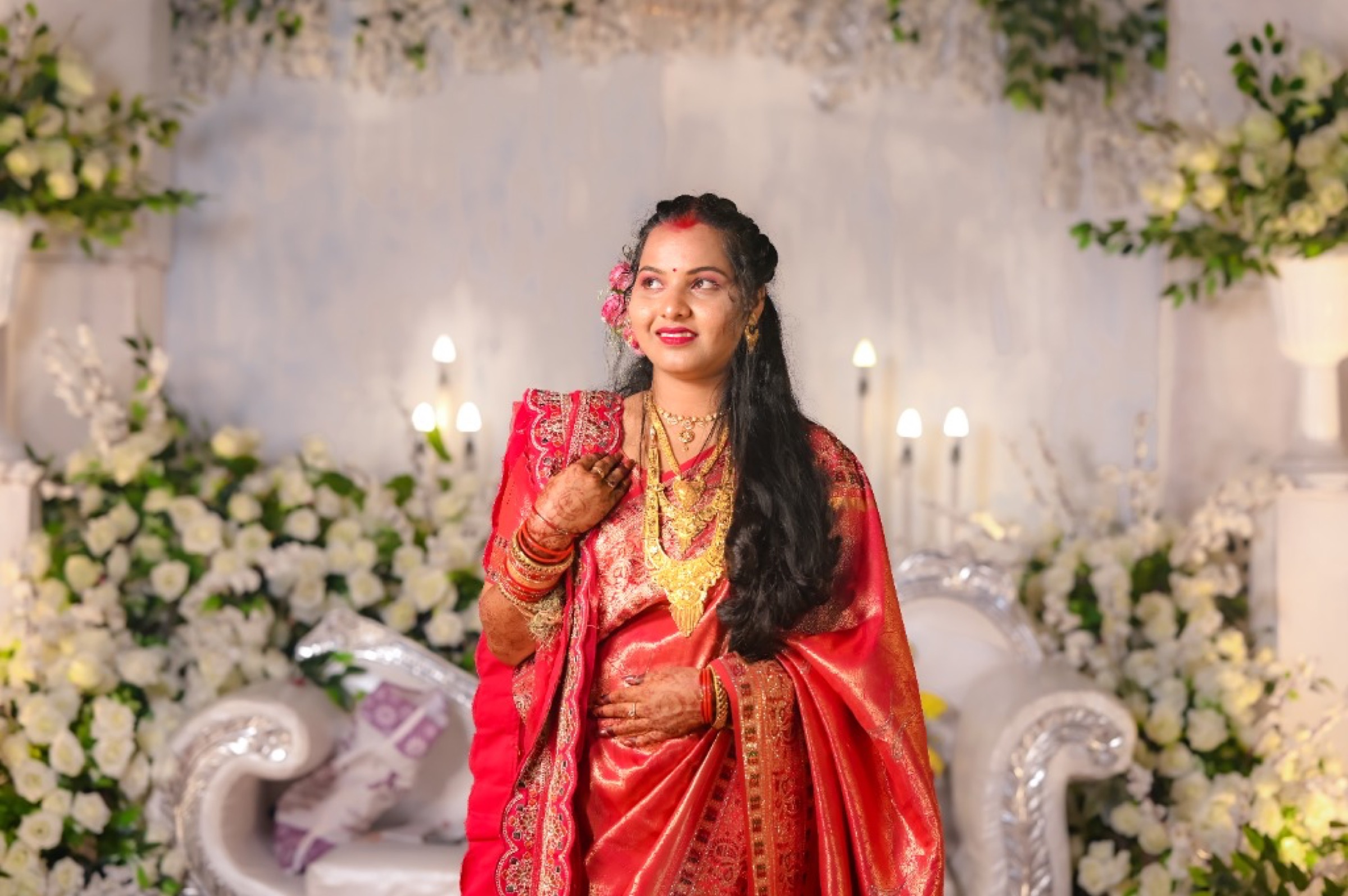 Bride adjusting heirloom jewellery, wedding photography in Bhubaneswar